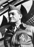 Lieutenant General Claire Lee Chennault (September 6, 1893 – July 27, 1958), was an American military aviator. A contentious officer, he was a fierce advocate of fight-interceptor aircraft during the 1930s when the U.S. Army Air Corps was focused primarily on high-altitude bombardment. Chennault retired in 1937, went to work as an aviation trainer and adviser in China, and commanded the 'Flying Tigers' during World War II, both the volunteer group and the uniformed units that replaced it in 1942.