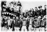 'Flying Tigers' was the popular name for the 1st American Volunteer Group (AVG) of the Chinese Air Force in 1941-1942. The pilots were United States Army (USAAF), Navy (USN), and Marine Corps (USMC) personnel, recruited under Presidential sanction and commanded by Claire Lee Chennault; the ground crew and headquarters staff were likewise mostly recruited from the U.S. military, along with some civilians. The group consisted of three fighter squadrons with about 20 aircraft each.<br/><br/>

The group trained in Burma before the American entry into World War II with the mission of defending China against Japanese forces. The Tigers' shark-faced fighters remain among the most recognizable of any individual combat aircraft of World War II, and they demonstrated innovative tactical victories when the news in the U.S. was filled with little more than stories of defeat at the hands of the Japanese forces. The group first saw combat on 20 December 1941, 12 days after Pearl Harbor. It achieved notable success during the lowest period of the war for U.S. and Allied Forces, giving hope to Americans that they would eventually succeed against the Japanese.